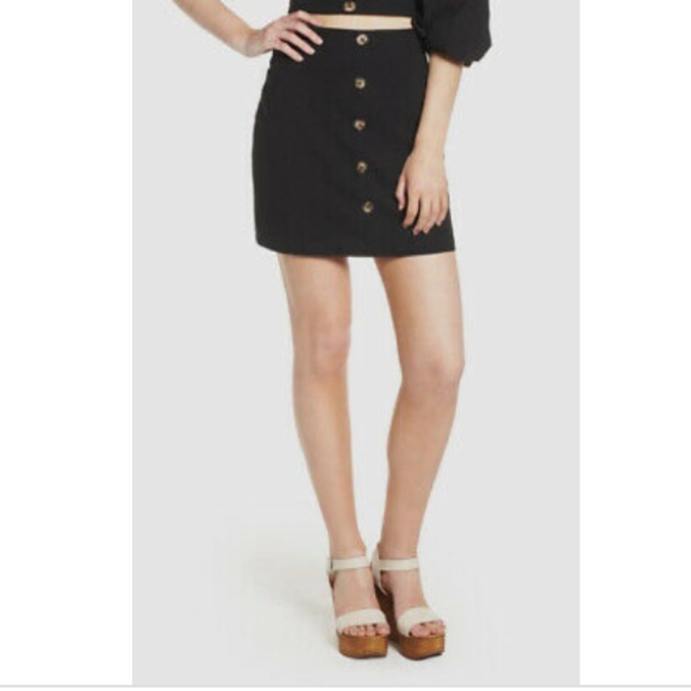Black high-waisted mini pencil skirt with buttons in size M by J.O.A.